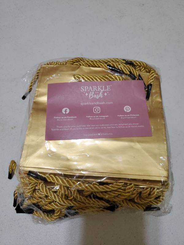 lot 63082 image: Gold gift bag with twisted rope handle 6x5 (23 bag) - Retail $8