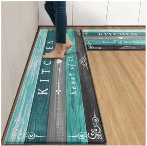 lot 17159 image: Teal Farmhouse Anti-Fatigue Kitchen Rug Set of 2 Grey Black Green Wood Vintage Cushioned Floor Standing Mat Waterproof Non-Slip Kitchen Mat and PVC Ergonomic Comfort Foam Rug. SMALL SCRATCH ON LARGE MAT. - Retail $28