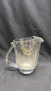 lot 830 image: Fostoria Glass Pitcher with Decorative Swirl Pattern - Manganese Glow (same pitcher as 828)
