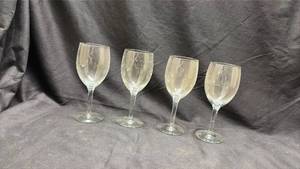 lot 849 image: Clear Glass Wine Glasses Set of Four - Neodymium Glow