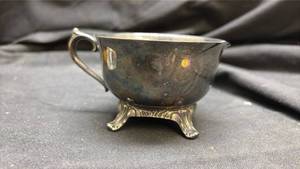 lot 892 image: Silver Plated Footed Teacup with Ornate Handle