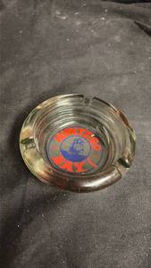 lot 907 image: Montego Bay Lawton Oklahoma Glass Ashtray with Ship Logo - Neodymium Glow