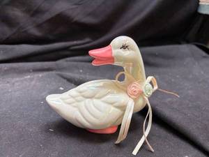 lot 924 image: Iridescent Ceramic Duck Figurine with Ribbon