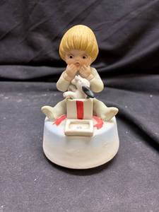 lot 926 image: Wind-Up Musical Figure Child with Dog