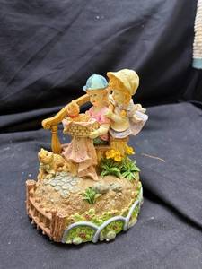 lot 928 image: Children on Stares Musical Figurine