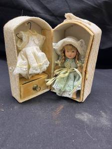 lot 943 image: Miniature Porcelain Doll with Wardrobe Trunk Set