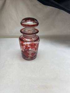 lot 952 image: Bohemian Ruby Flash Cut Glass Cologne Bottle with Stopper