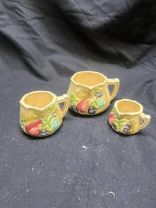 lot 978 image: Japanese Ceramic Measuring Cup Set with Embossed Fruit Design