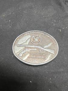 lot 979 image: NRA Member Commemorative The Guns of John Wayne Belt Buckle