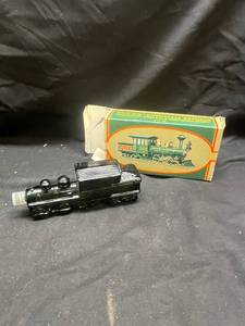 lot 982 image: Avon 1876 Centennial Express Wild Country After Shave Bottle with Box