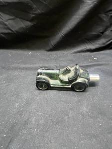 lot 1000 image: Avon Wild Country After Shave Green Glass Car Decanter