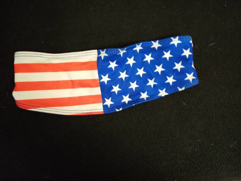lot 2128 image: Patriotic Headband with silicone band to prevent slipping.