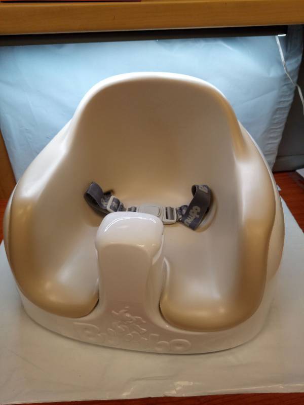 lot 1105 image: Bumbo Multi Seat Baby Floor Seat with Safety Harness Beige - Retail $60