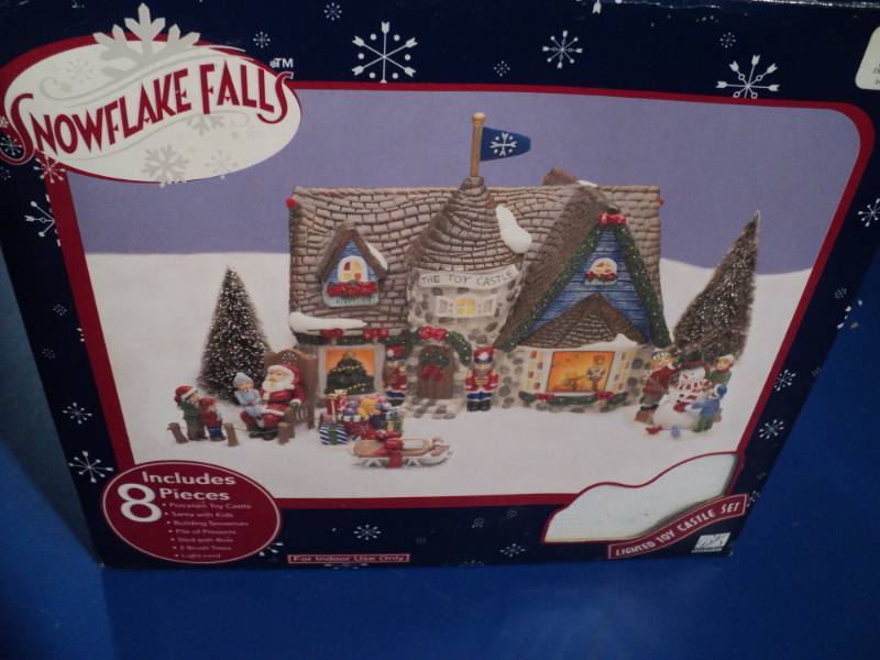 lot 4379 image: Snowflake Falls Lighted Toy Castle set, open box missing light cord