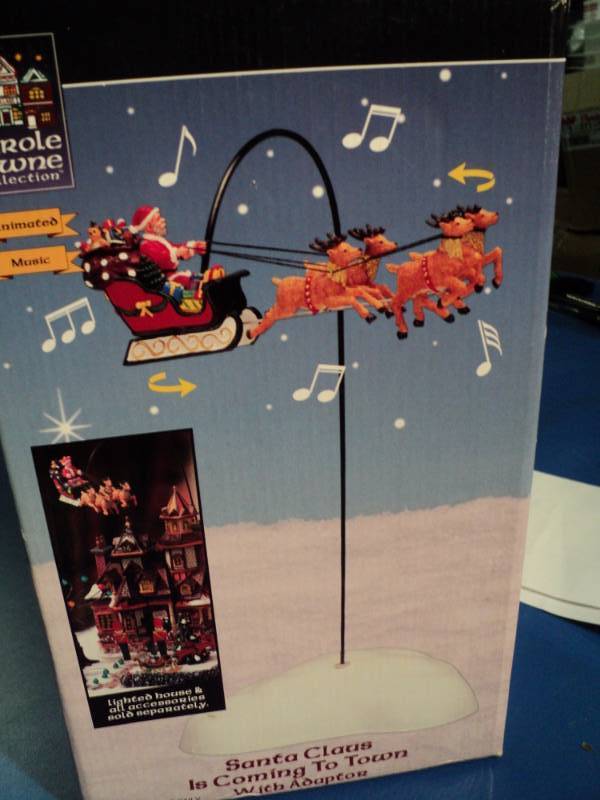 lot 4384 image: Carole Town Collection Santa Claus is Coming to Town wadapter, open box, appears complete