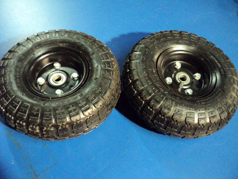 lot 4436 image: (1) pair Nylon Tube Type Tires 4.103.50- LG-4-20 and up, 10 diameter x 2 thick w 34 diameter center hole