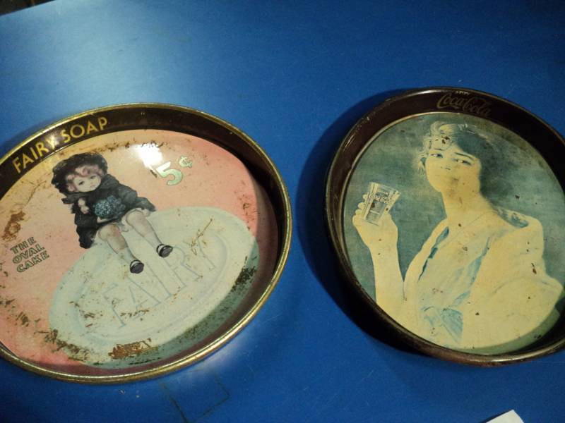 lot 4444 image: (2) ct. metal trays, (1) Oval Coca Cola 15 x 12-12, (1) round Fairy Soap 14 diameter