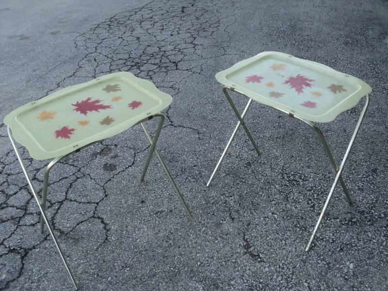 lot 4469 image: (2) ct. lot Vintage Tray Tables, plastic top, metal legs, 18 x 22 x 24 broken bracket on one table, Fall leaves