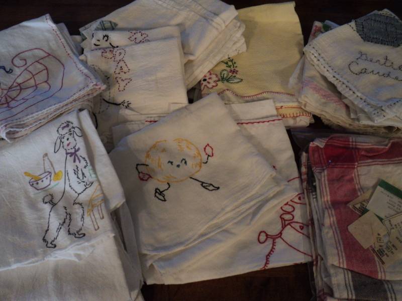 lot 4494 image: Large lot of dishtowels, many with needle point detail, assorted colors, styles and sizes