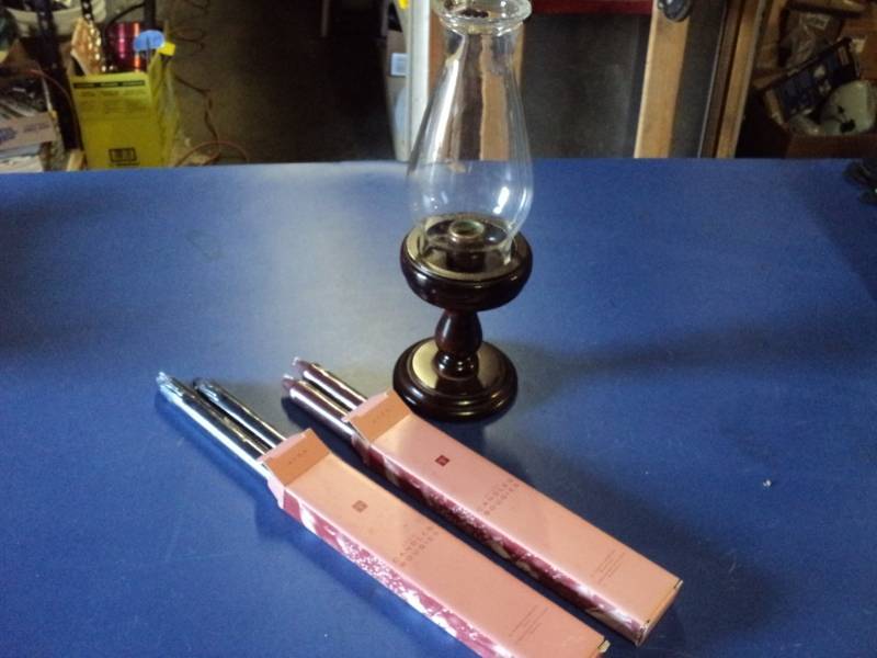 lot 4517 image: Mixed lot Wooden Candle holder with hurricane style shade and (2) boxes of Avon Taper Candles, 2 candles per box