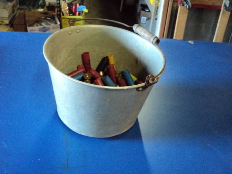 lot 4519 image: Metal Pail with spent shot gun shells