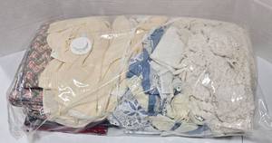 lot 549 image: Mystery bag of sheets, curtains, tablecloths.  Unopend, unsearched
