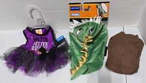 lot 676 image: XS Pet Halloween Outfits x 3.  Witch, Dinosaur and an extra Sweater