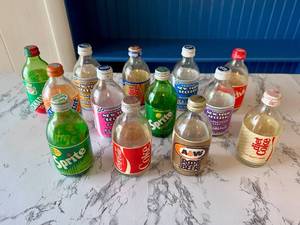 lot 124 image: Vintage Soda Bottle Collection 10 oz Glass Bottles Mixed Brands