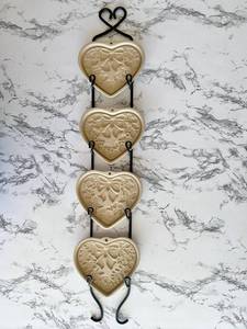 lot 132 image: Vintage Pampered Chef 2003 Seasons of The Heart Stoneware Cookie Molds with Display Hanger