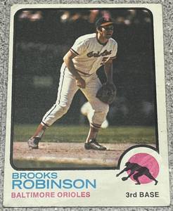 lot 185 image: 1973 Topps Baseball Card #90 - Brooks Robinson Baltimore Orioles