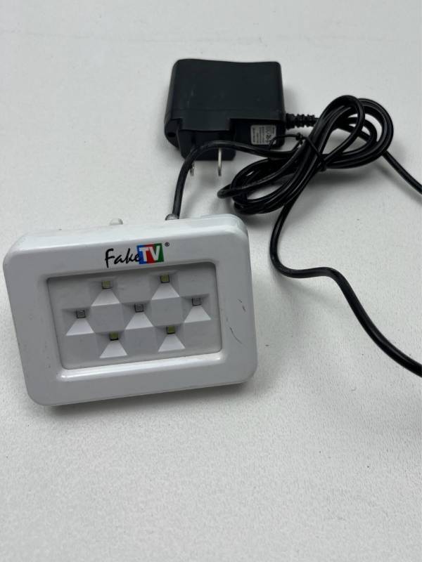 lot 155 image: FakeTV FTV-7 Burglar Deterrent LED Light Simulator with Power Adapter