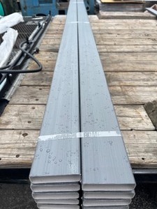 lot 297 image: Bundle of 16 Grey PVC Long Skinny Panels - 8 x 3 x � - Grey Wood Design Hollow - Great for Privacy Fences - Wall Decor Etc