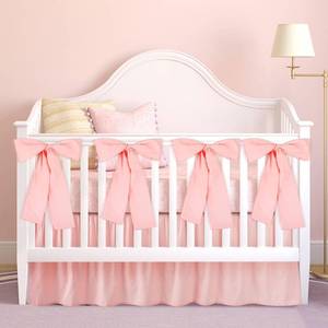 lot 9426 image: SmoothNovelty Pink Crib Bed Skirts with 4 Large Cot Bow 28 x 52 Baby Crib Skirt for Boys Girls Nursery Toddler Bedskirt Dust Ruffle 14 Drop - Retail $25