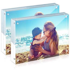 lot 19785 image: HELPLEX Acrylic Frames, 2 Pack 5x7, 24mm Thicker Frameless Clear Picture Frame, Double Sided Magnetic, Free Standing Desktop Display - Retail $27