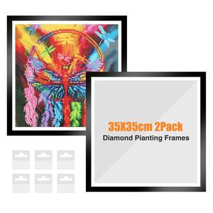 lot 18531 image: NAIMOER Upgraded 2Pack Diamond Painting Frames for 35x35cm Canvas, Magnetic Art Frame Self-Adhesive With Hooks for Wall Window Door (Black) - Retail $19