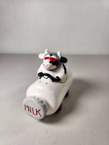 lot 164 image: Clay Art Cow Driving Milk Truck Salt and Pepper Shakers