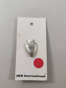 lot 183 image: JHB International Silver-Tone Arrowhead Button with Engraved Symbols