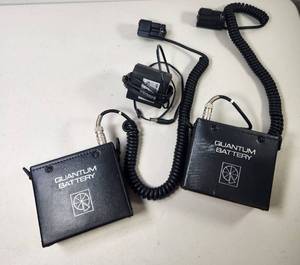 lot 209 image: Quantum Battery 1 Flash Power Pack Set of 2 with Charger and Cables