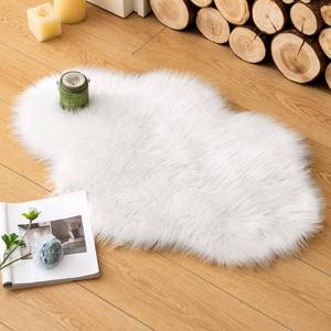lot 7874 image: MIULEE Fluffy Rug Soft Shaggy Faux Fur Area Rug Luxury Plush Cloud Shape Carpet for Christmas Decor Bedroom Living Room Sofa Chair 2 x 3 Feet, White