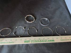 lot 20 image: Silver-Tone Bangle and Bracelet Set (7 Pieces)