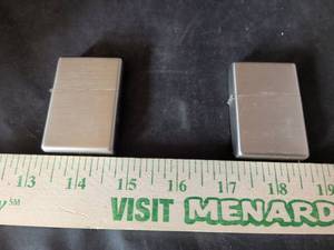 lot 21 image: Zippo Brushed Chrome Windproof Lighters Set of 2