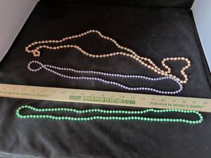 lot 89 image: Set of 3 Long Beaded Necklaces in Pink, Purple, and Green