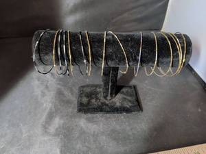 lot 109 image: Set of Thin Metal Bangle Bracelets