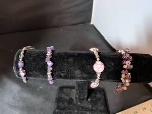 lot 142 image: Set of 4 Purple and Pink Beaded Bracelets