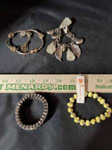 lot 167 image: Mixed Bracelet Lot of 4 - Rhinestone Stretch, Charm, Bangle, and Minions Bead Bracelets