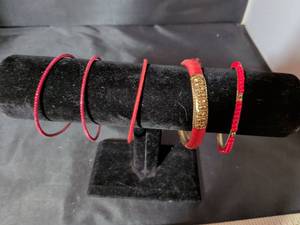 lot 180 image: Red Bracelet Set with Gold Accents
