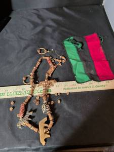 lot 182 image: African Wooden Bead Necklace with Animal Figures and Pan-African Flag Patch. Needs repaired