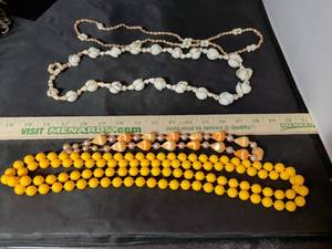lot 184 image: Four costume bead and shell necklaces