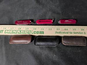 lot 192 image: Set of 3 Advertising Swiss Army Style Pocket Knives with Leather Cases
