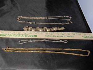 lot 205 image: Gold and Silver Tone Costume Jewelry Set - Necklaces.
